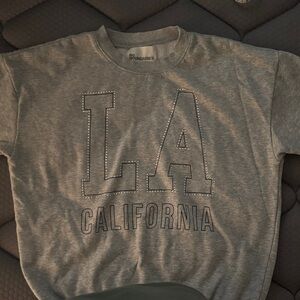 No Boundaries Women’s Crew Neck Sweatshirt.